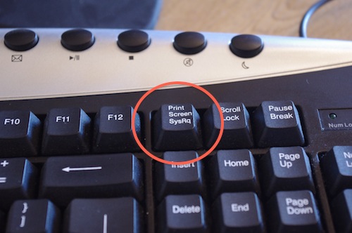 "an image of a key board with the print screen button highlighted